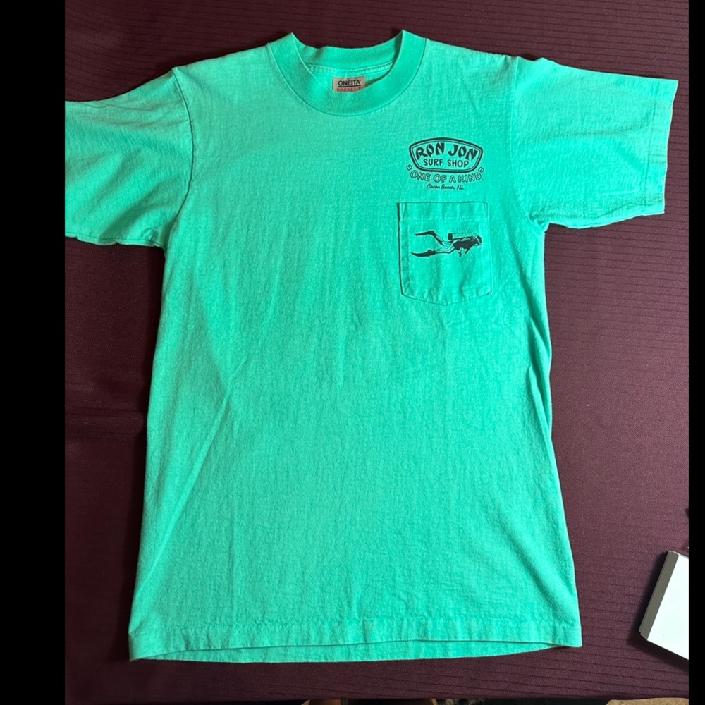 Vintage Turquoise 1990 Run Jon Surf Shop T-Shirt in excellent condition - Unisex